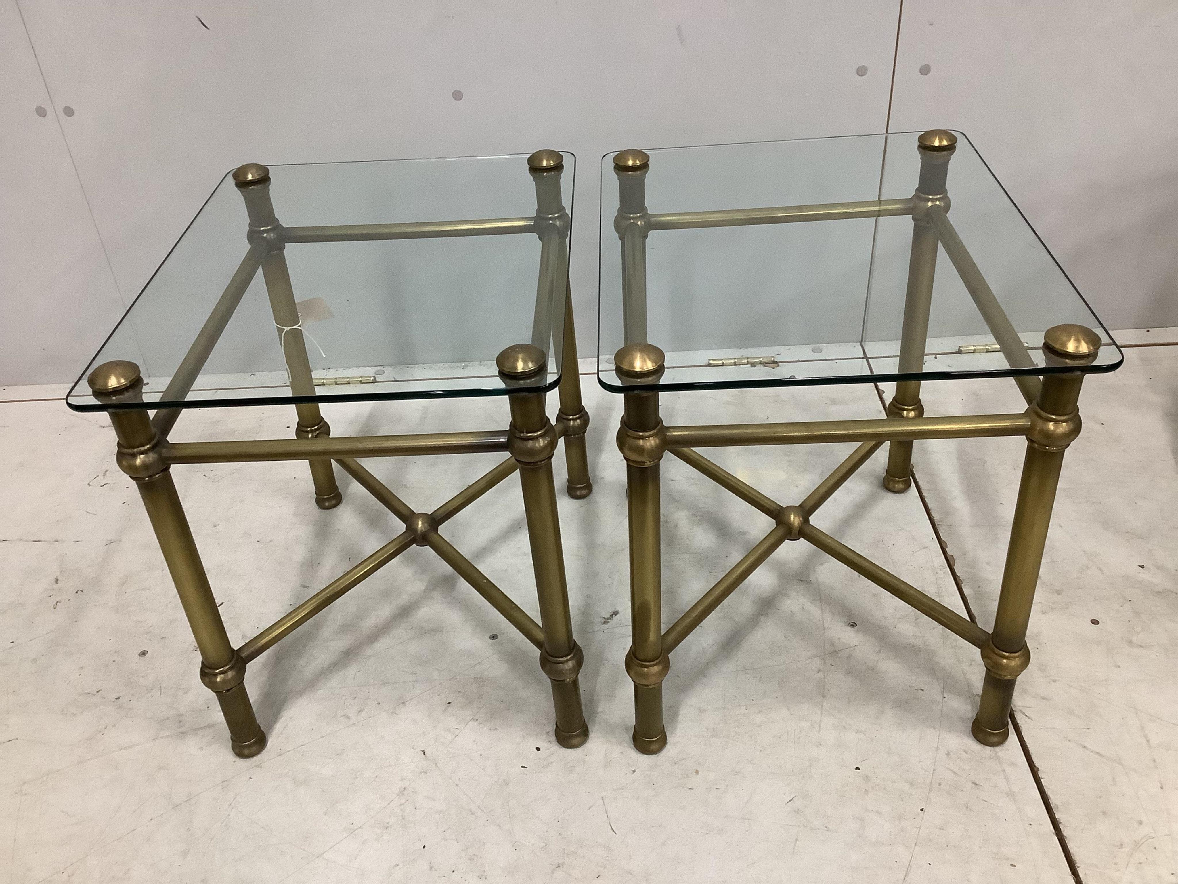 A pair of contemporary lacquered brass square glass top occasional tables. Width 41cm, height 51cm. Condition - good